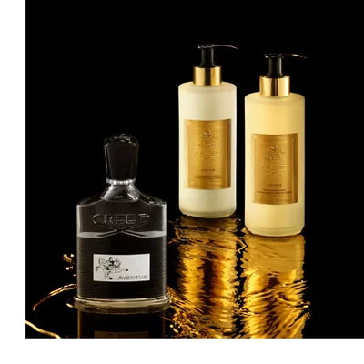 Creed Aventus fragrance bottle shower gel and after-shave lotion are shown with text CREED 1760 AVENTUS GEL DOUCHE SHOWER GEL CREED AVENTUS EMULSION APRES-RASAGE LOTION AFTER-SHAVE AVENTUS.